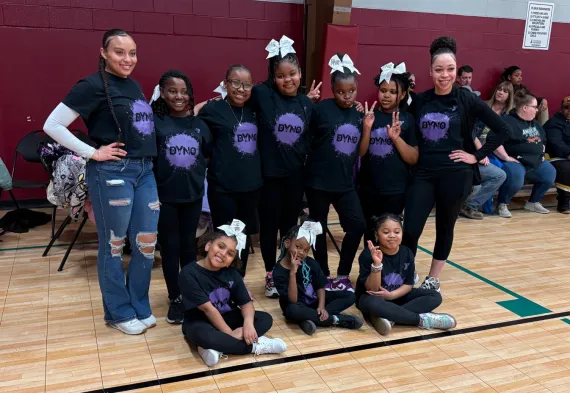 photo of dyno dance & cheer team with their coaches
